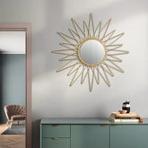 "Artistic starburst mirror as a statement wall decor piece