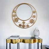CHONKO wall mirror with gold flower petal wire design