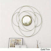 Gold wire frame round mirror on a modern minimalist white wall