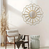 Golden heart-shaped petal frame mirror hanging in bedroom wall decor