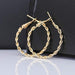 golden hollow circle earrings