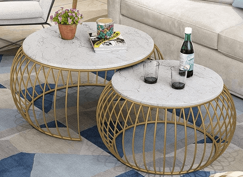 Modern metallic coffee table with sleek metal legs and a smooth wooden tabletop, perfect for adding a contemporary touch to any living space