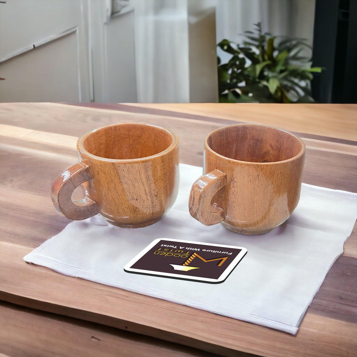 A set of 2 handcrafted wooden cups