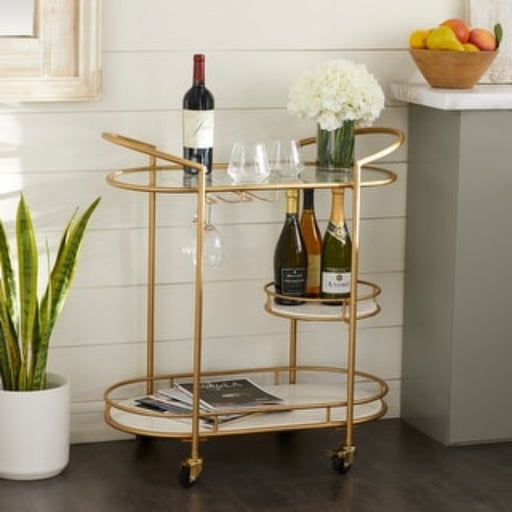 Modern Golden Oval Trolley with Glass Top and Marble Bottom