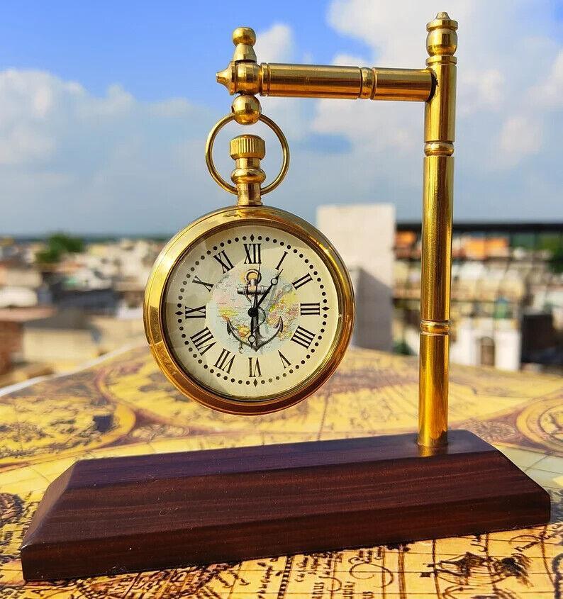 A desk clock with a rich wooden base