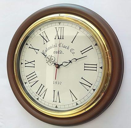 Warm wooden finish, brass accents