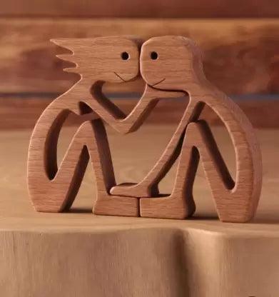 Handcrafted wooden family statue 