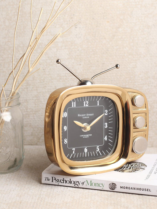 Golden retro TV timepiece