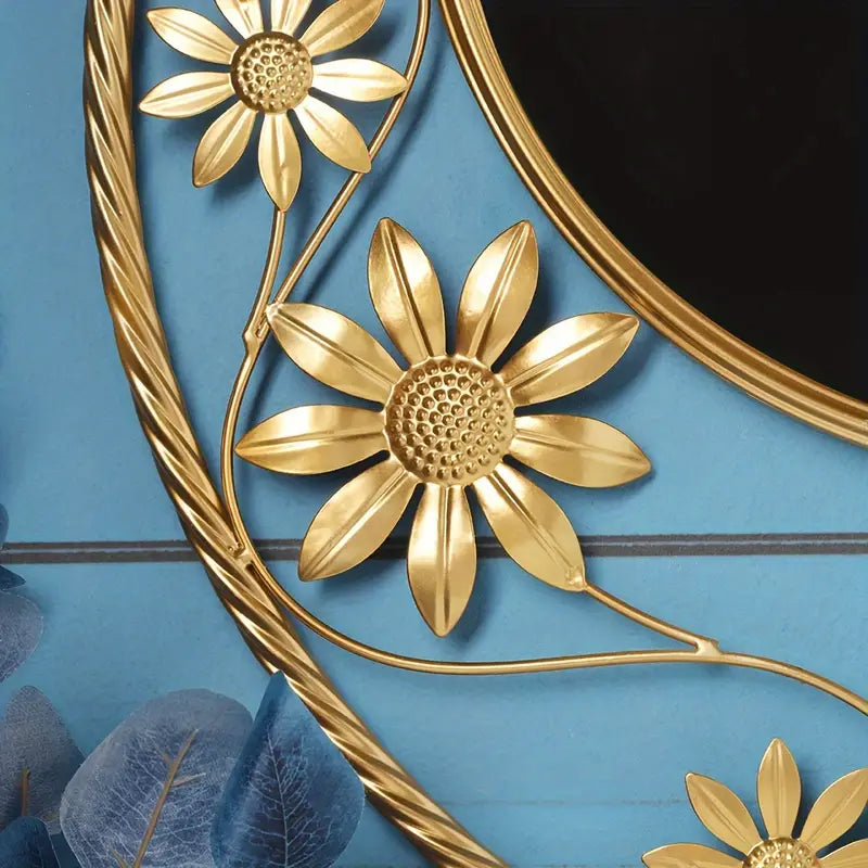 Gold wireframe mirror with blooming flower silhouette