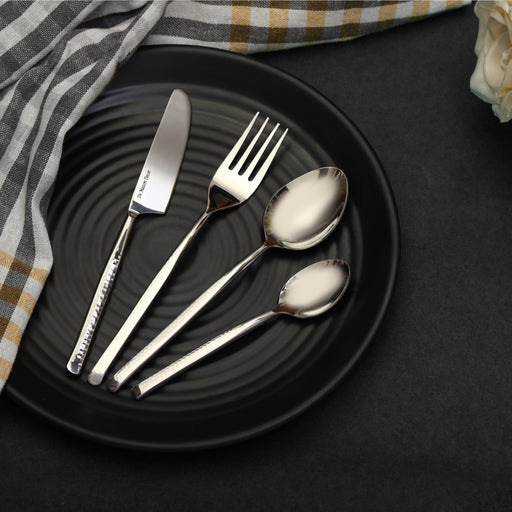Unique silver flatware with dot hammered design