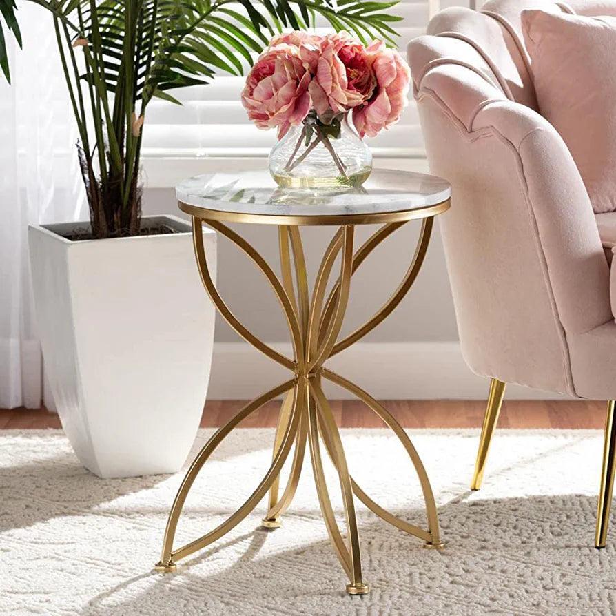 A Golden Side Table With a Flower Design