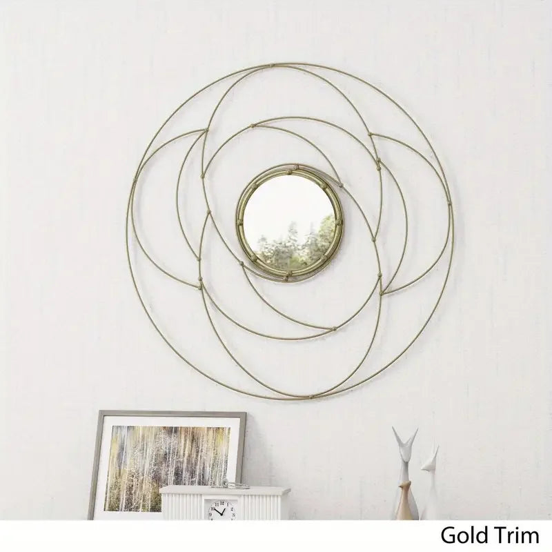 Gold wire frame round mirror on a modern minimalist white wall