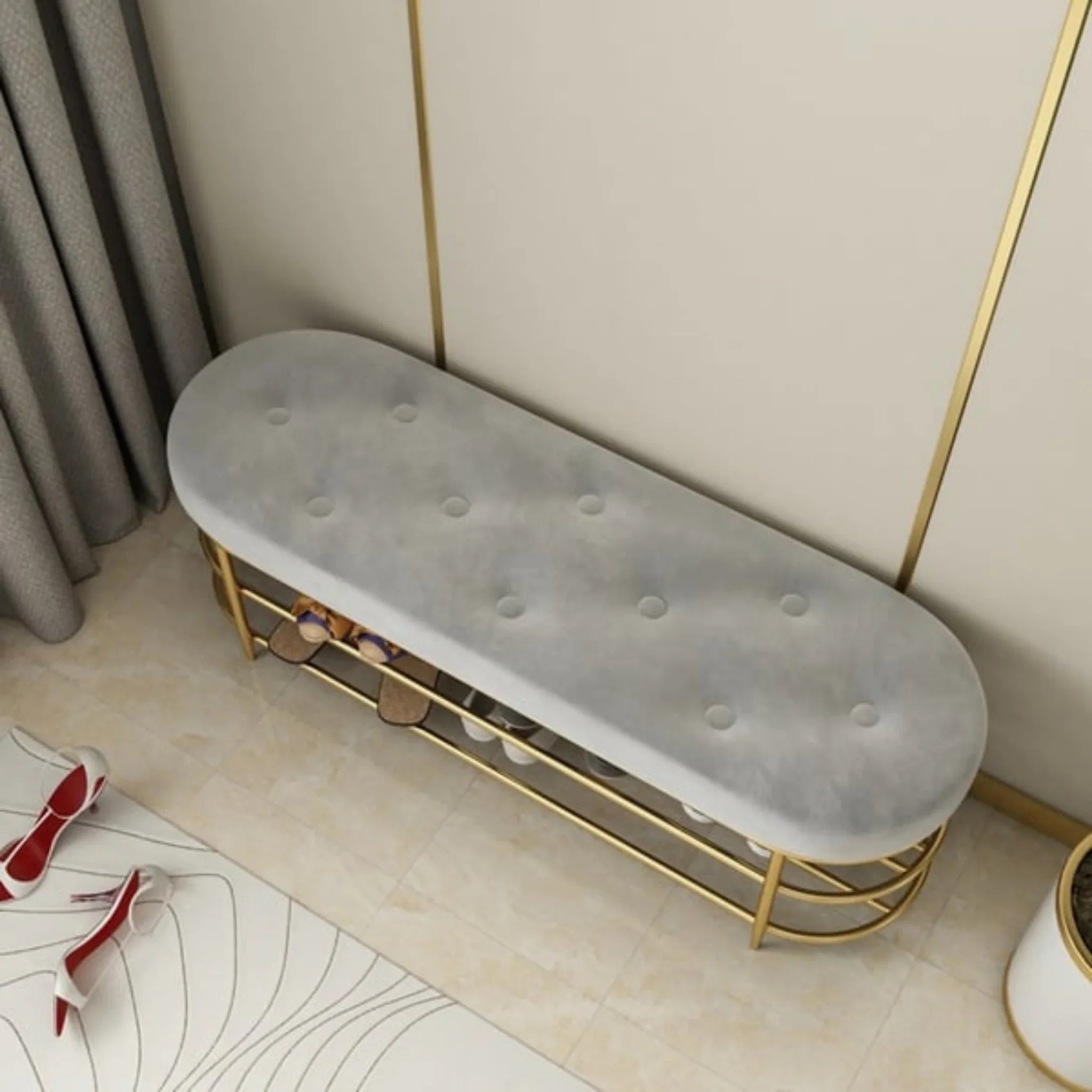Grey tufted bench with gold metal frame 