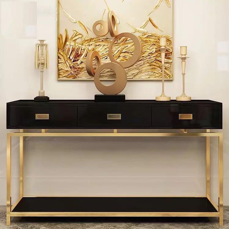 A modern black console with three drawers