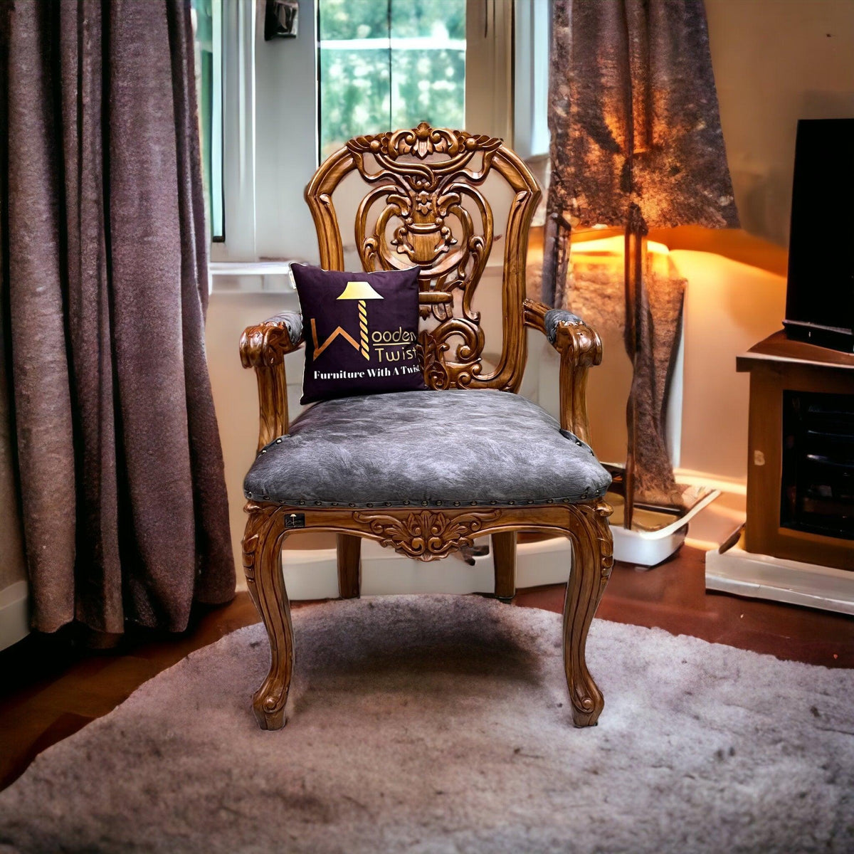 A Designer Back Armchair in Solid Teak
