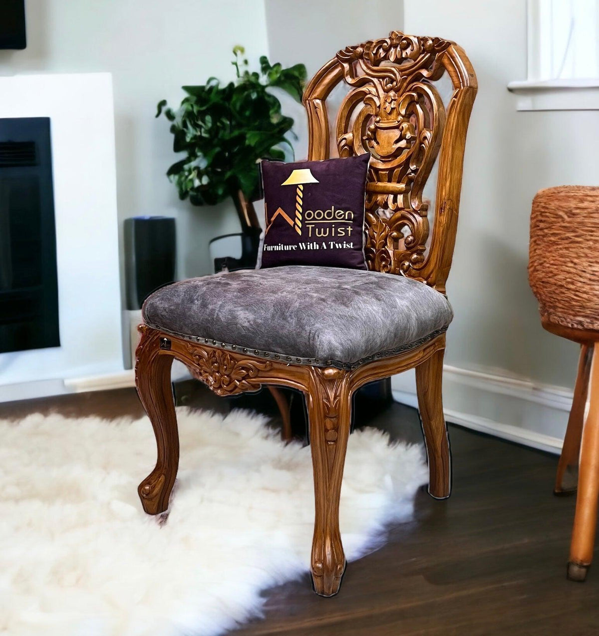 A Designer Back Dining Chair in Solid Teak
