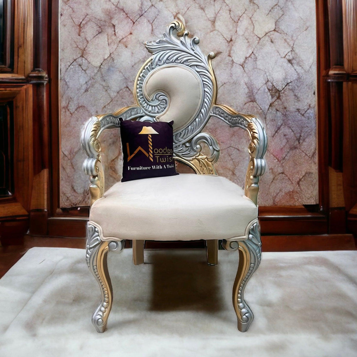 A hand carved teak wood armchair