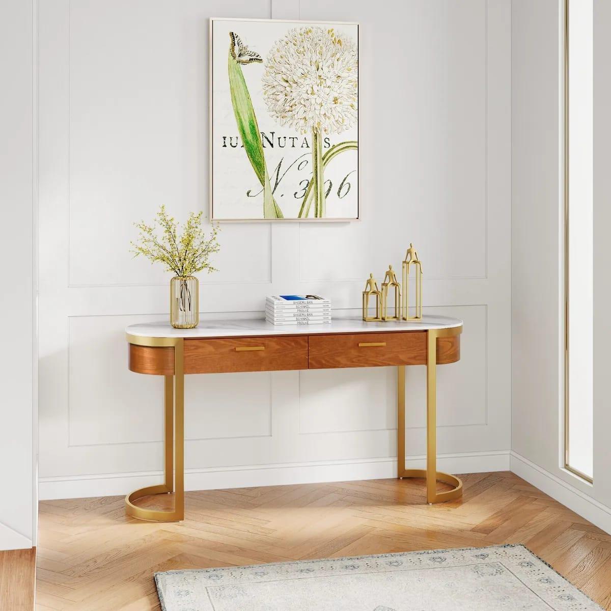A white marble oval console with storage