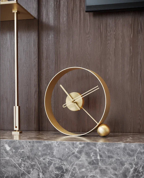 A table clock suspended in a ring