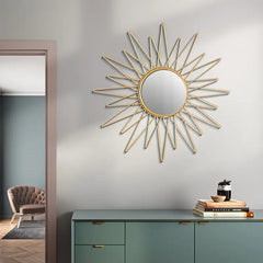 Wall-mounted sunburst design mirror with luxury gold finish"
