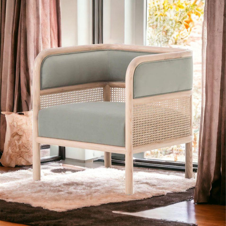 Grey single seater sofa with natural cane paneling