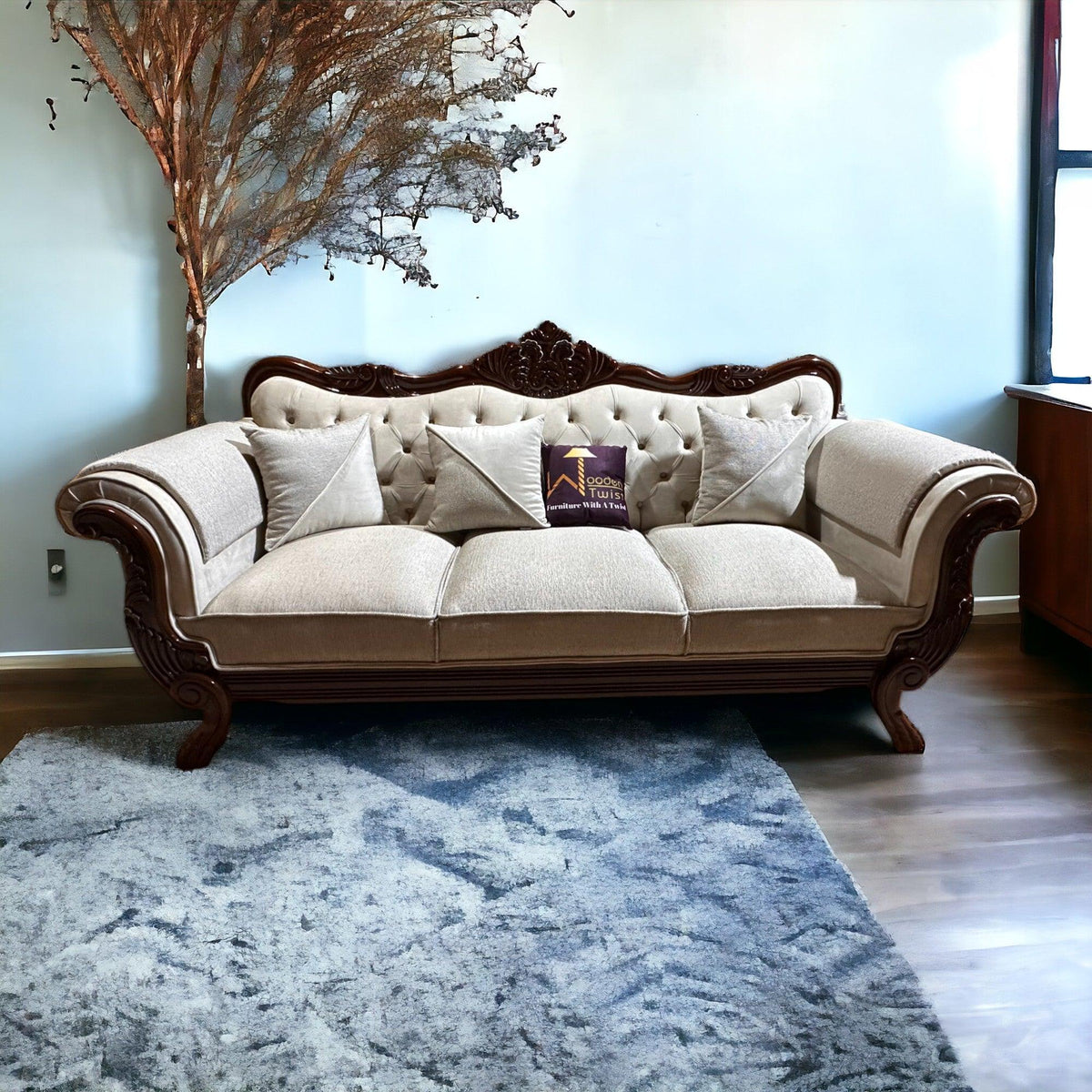 Hand-carved teak, button-tufted comfort