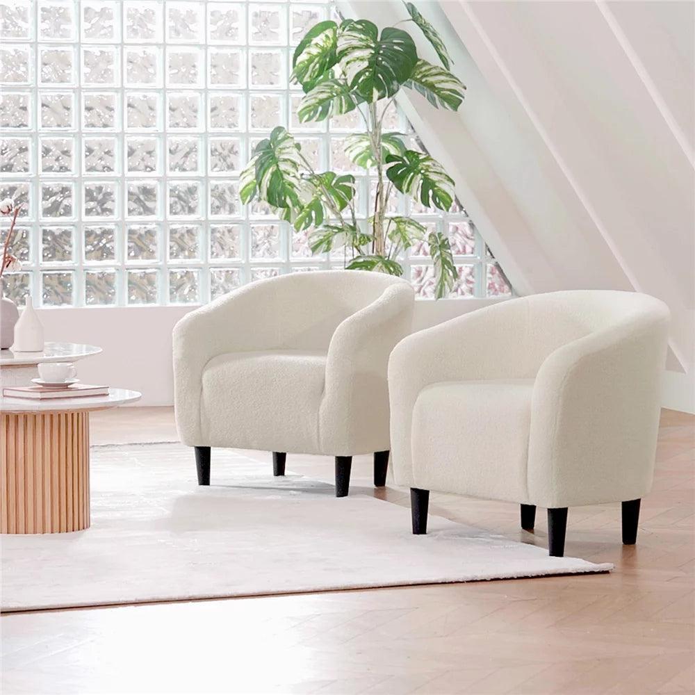 A pair of comfy globe-style boucle chairs