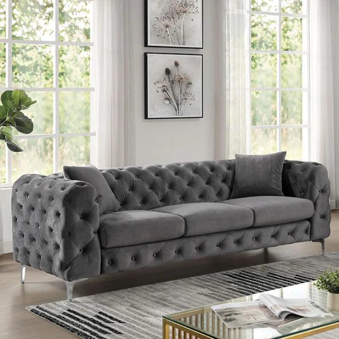 A button tufted 3 seater sofa with metal legs