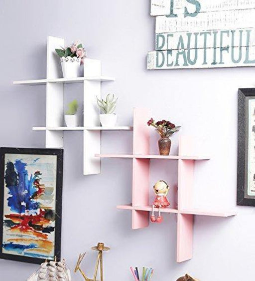 white and pink wall shelf