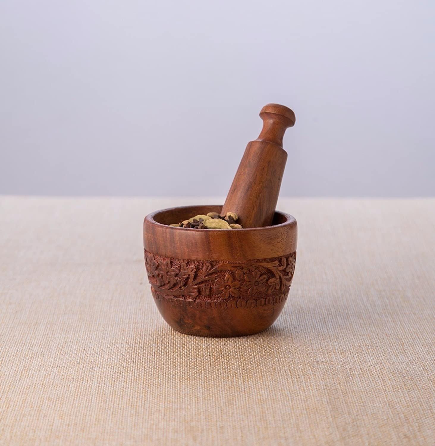 Brown Sheesham wood mortar bowl with polished interior