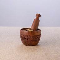 Brown Sheesham wood mortar bowl with polished interior