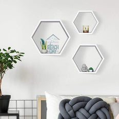 White Hexagonal Wooden Floating Wall Shelves Set of 3 on wall - WoodenTwist