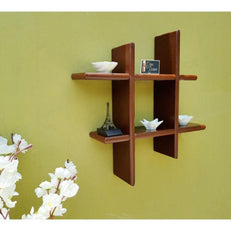 Criss Cross Floating Wall Shelf in a bedroom setting