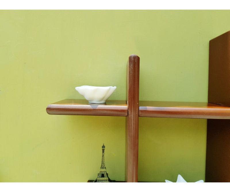 Criss Cross Floating Wall Shelf styled with indoor plants