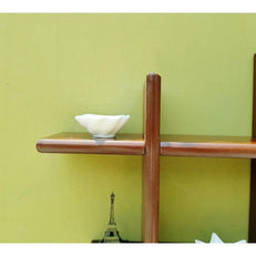 Criss Cross Floating Wall Shelf styled with indoor plants