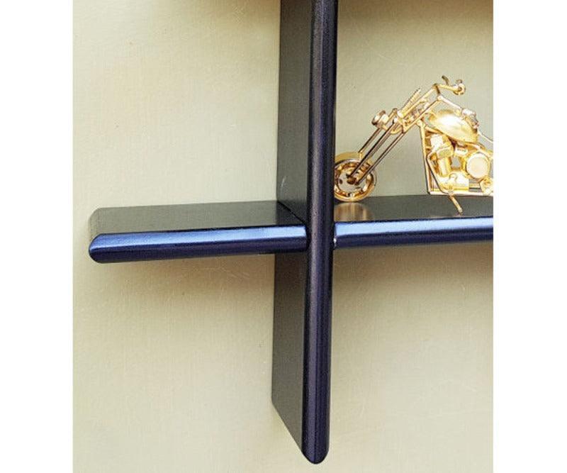 Criss Cross Floating Wall Shelf holding books and decor