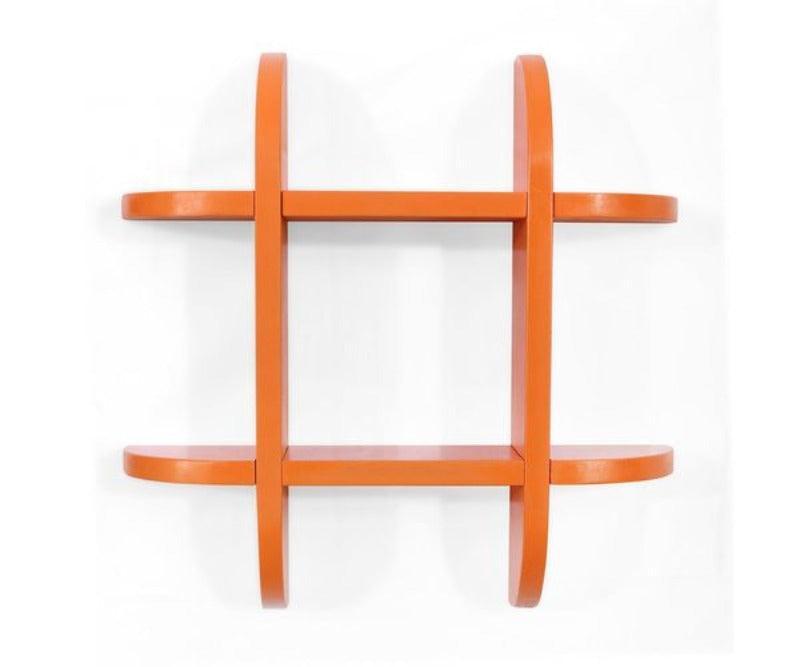 Wooden Criss Cross Floating Shelf holding books and photo frames