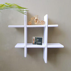 Criss Cross Floating Wall Shelf holding photo frames