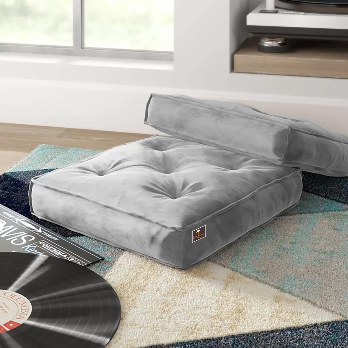 A Velvet Floor Pillow in Light Gray