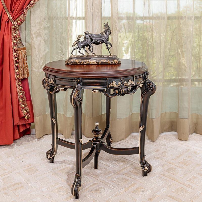 Graceful Carved Round Table in Teak Wood