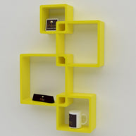 Rafuf Intersecting Floating Wall Shelves in Yellow holding decor
